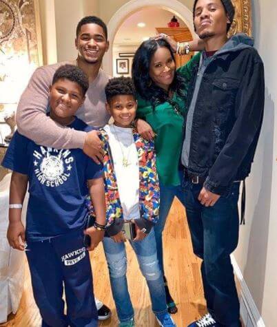 Naviyd Ely Raymond with parents, Usher and Tameka Foster, and siblings.